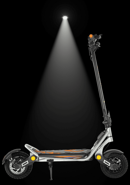 Side view of the 🇮🇪🇪🇺 KUKIRIN A1 electric scooter under a spotlight, showcasing its sleek design and features.