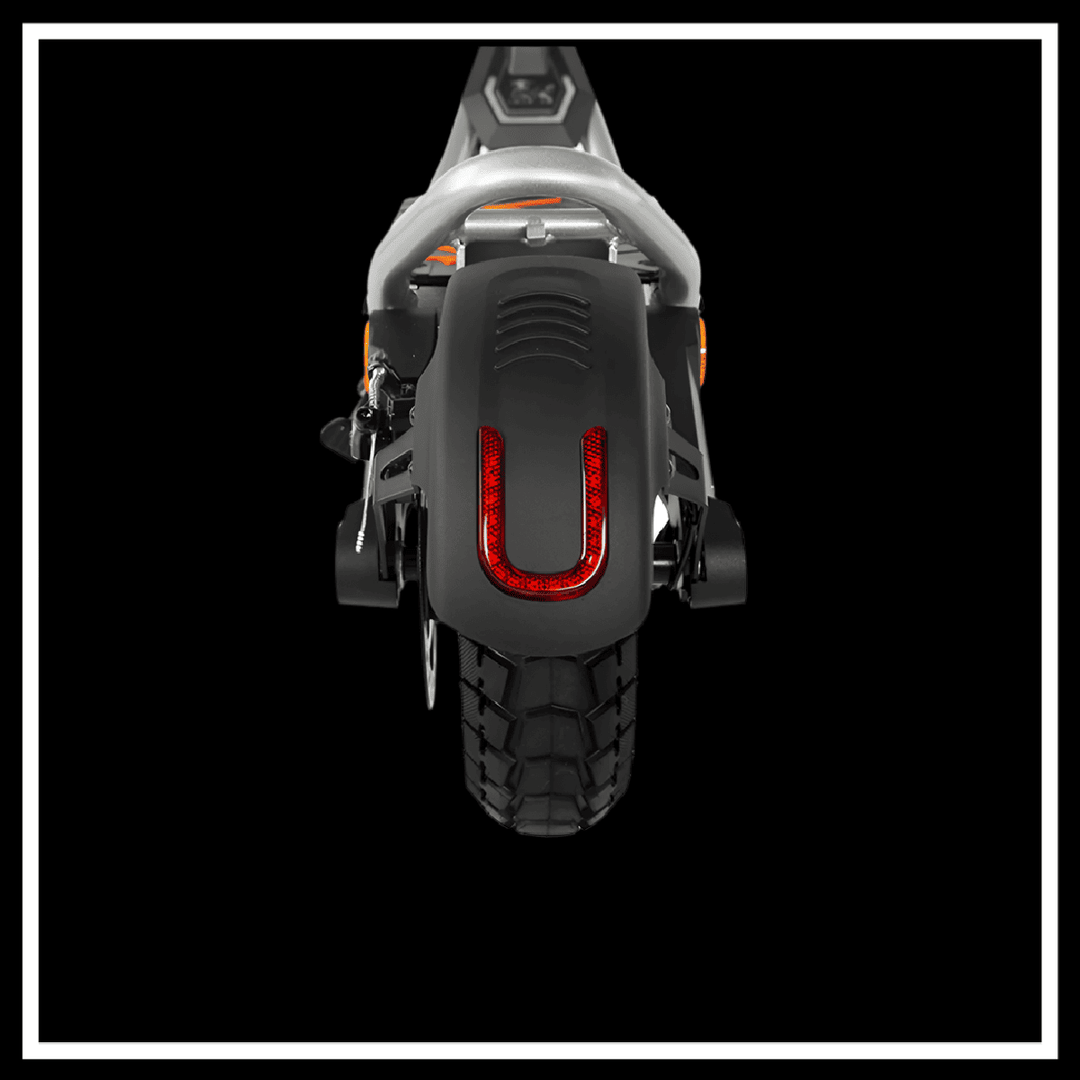 Rear view of KUKIRIN A1 ELECTRIC SCOOTER showcasing taillight and robust tire design.