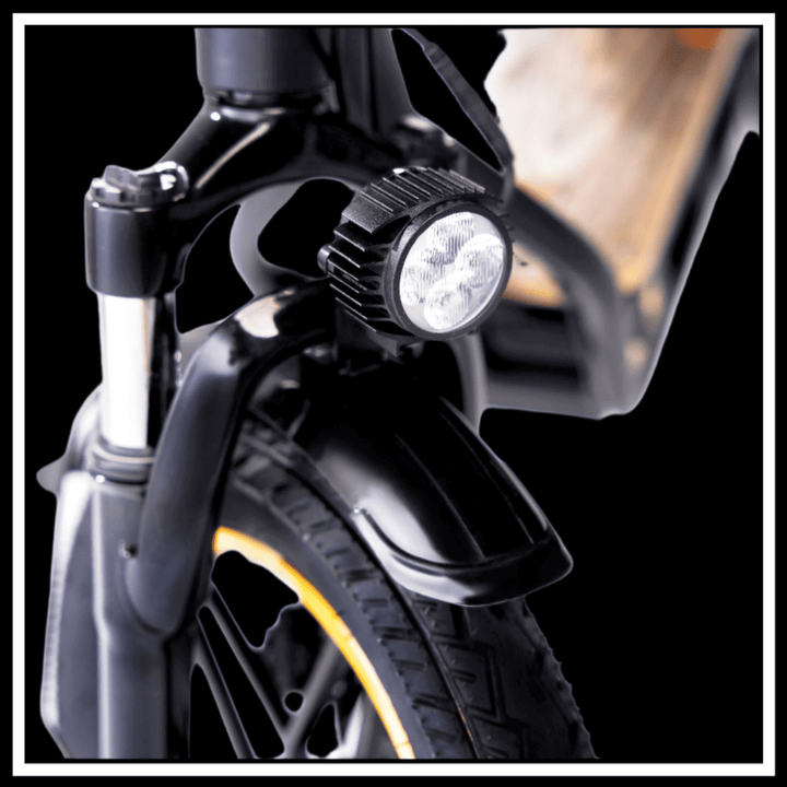 Close-up of the front light and tyre of the 🇮🇪🇪🇺 KUKIRIN C1 PRO electric scooter.