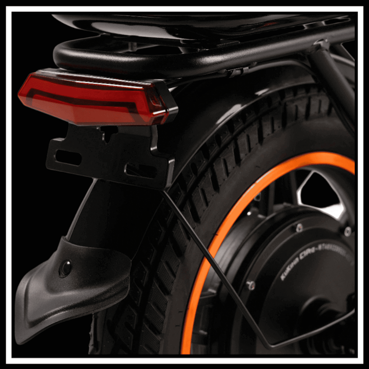 Close-up of the rear section of the 🇮🇪🇪🇺 KUKIRIN C1 PRO electric scooter showing the tire and brake light.