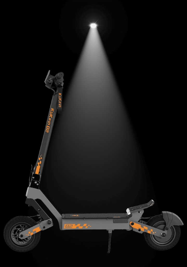 🇮🇪🇪🇺 KUKIRIN G2 electric scooter showcased under spotlight for a stylish look.