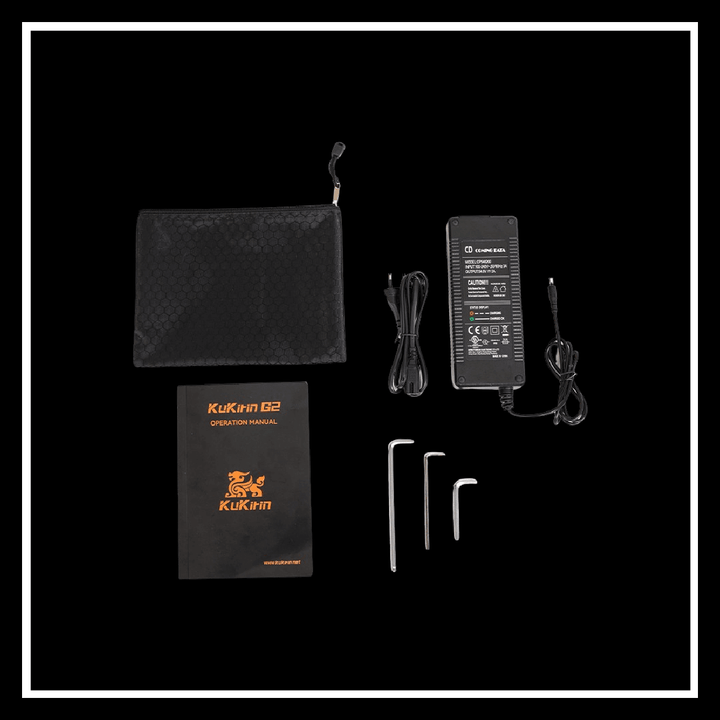 Kukirin G2 electric scooter accessories including charger, manual, and tools in a flat lay arrangement.