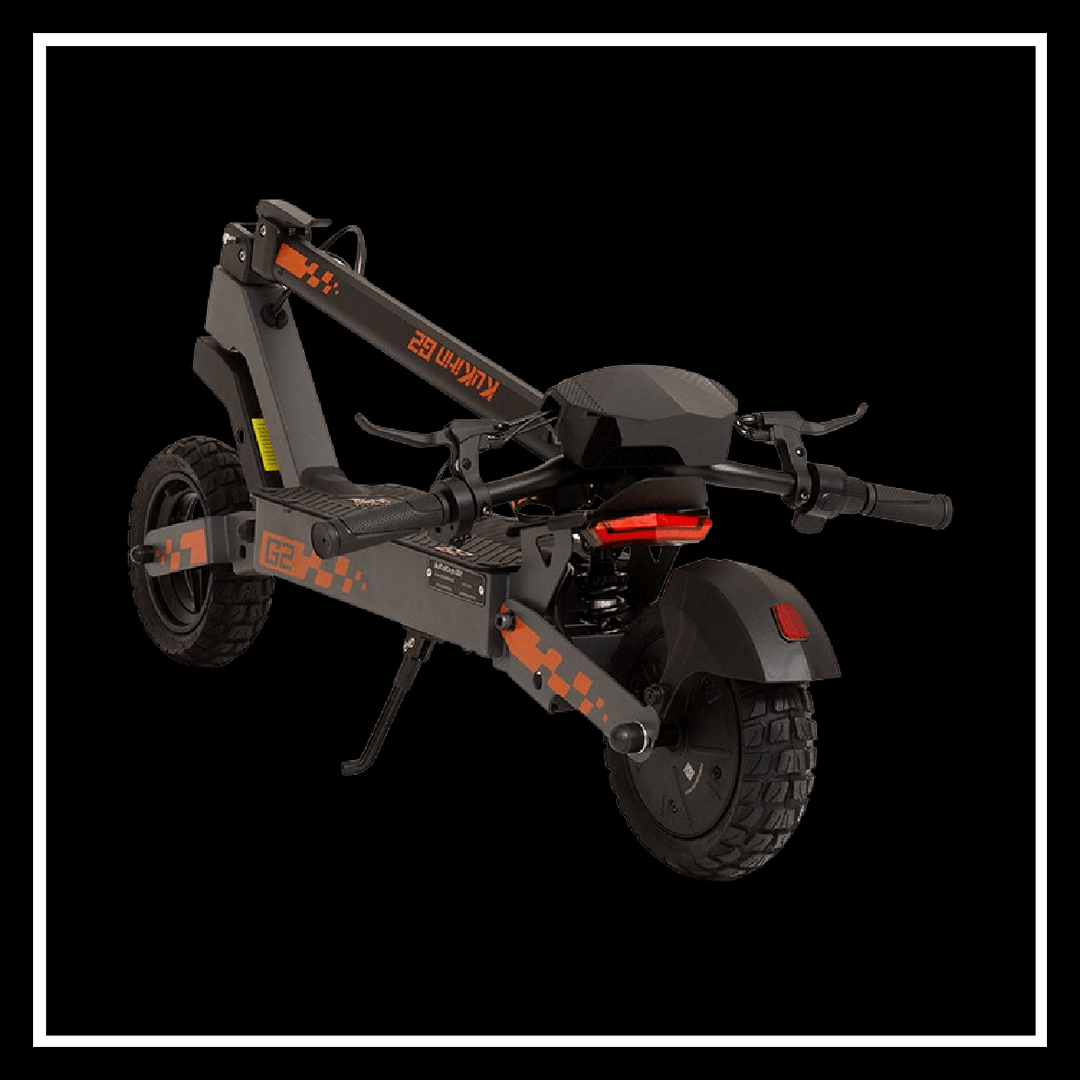 Folding design of 🇮🇪🇪🇺 KUKIRIN G2 electric scooter showcasing its sleek frame and robust tires.