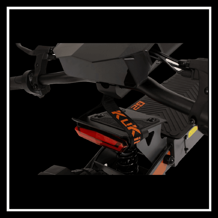 KUKIRIN G2 electric scooter detail showcasing the handle and rear light with anti-slip texture.