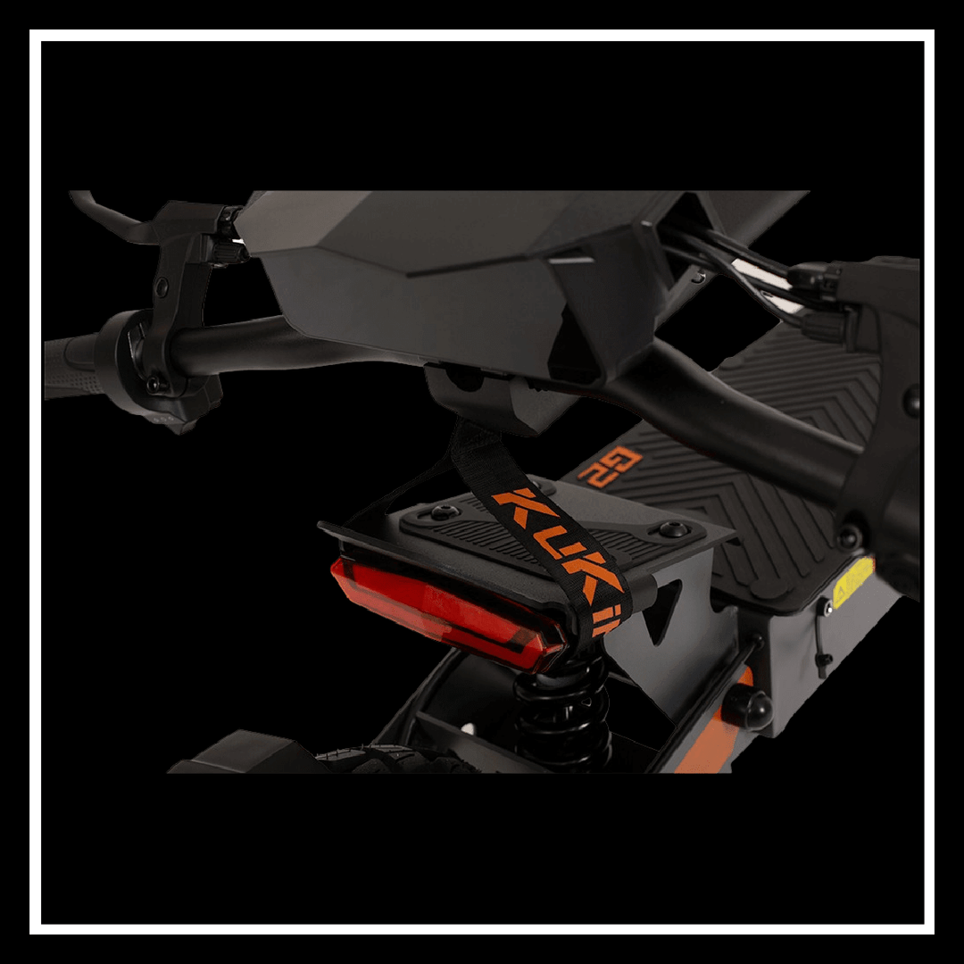 KUKIRIN G2 electric scooter detail showcasing the handle and rear light with anti-slip texture.