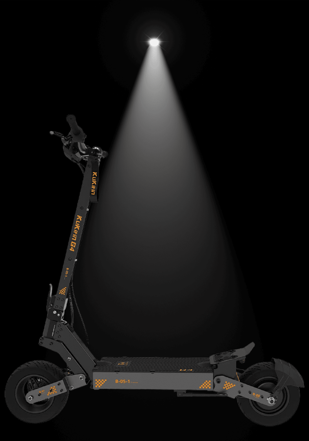 Kukirin G4 electric scooter illuminated by spotlight against dark background showcasing its sleek design.