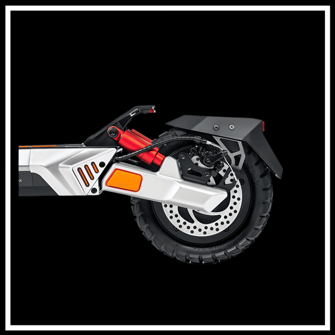 KUKIRIN M4 MAX rear wheel and suspension detail showcasing dual disc brakes and robust tire design.