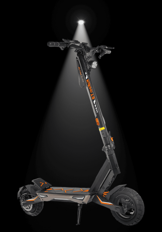 KUKIRIN T3 ELECTRIC SCOOTER illuminated in spotlight against black background, showcasing its sleek design and features.