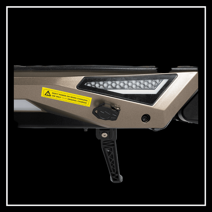 Close-up view of the KuKirin T3 electric scooter, showcasing its sleek design and safety features.