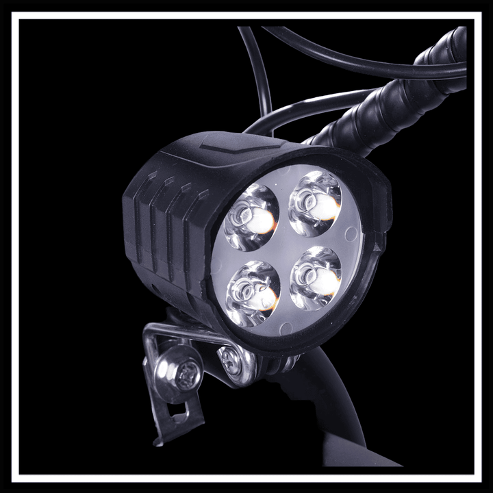 Close-up of the GOGOBEST GF200 FOOD-DELIVERY CARGO E-BIKE headlight with four bright LEDs.
