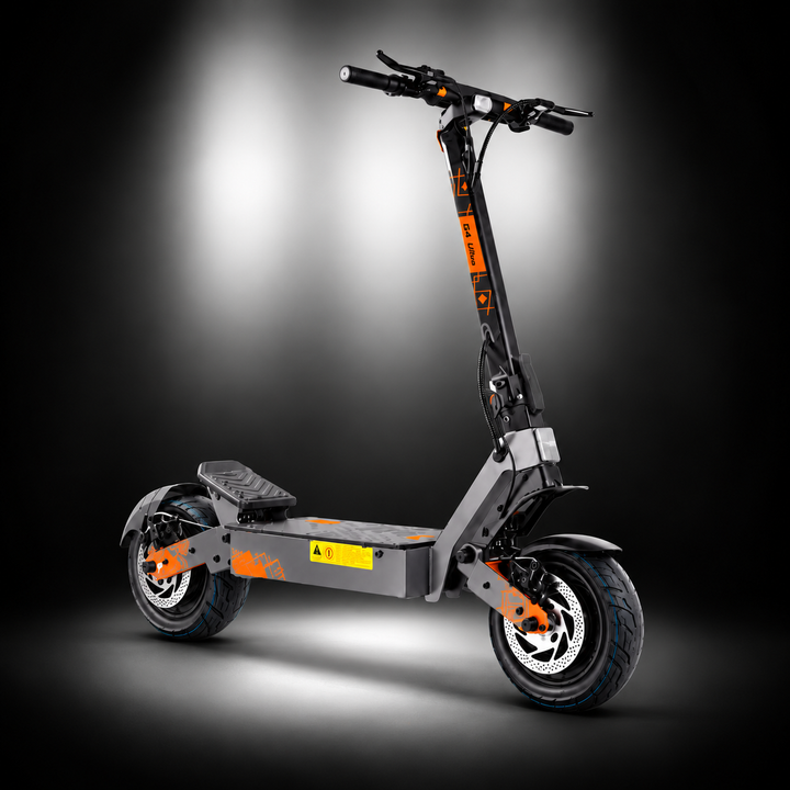 Kukirin G4 Ultra Electric Scooter - A modern electric scooter KUKIRIN G4 ULTRA with a grey frame, black tyres and handlebars, and bright orange accents, shown on a dark studio background with spotlighting.