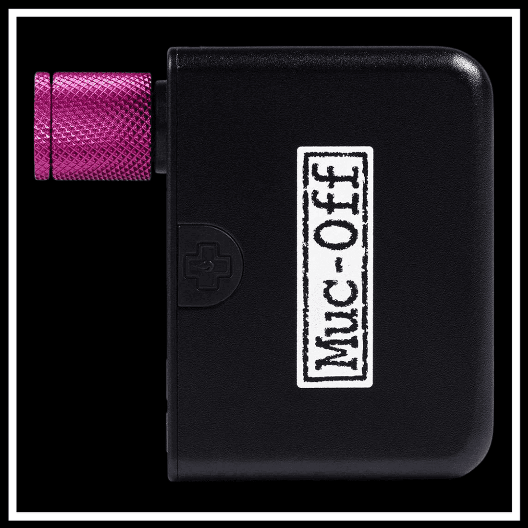MUC-OFF AIRMACH MINI INFLATOR ELECTRIC BIKE ACCESSORY side view showing the pink nozzle and Muc-Off branding.