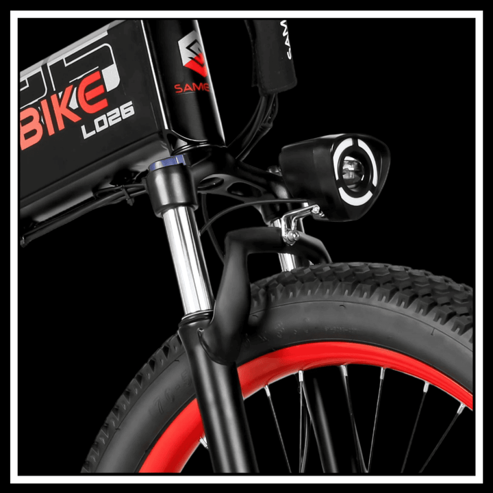 Close-up view of SAMEBIKE LO26 PLUS 1000W ELECTRIC BIKE front fork and headlight.