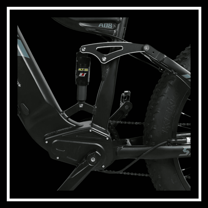 Close-up view of SAMEBIKE RSA08-II's rear suspension and powerful motor, showcasing its robust design for off-road biking.