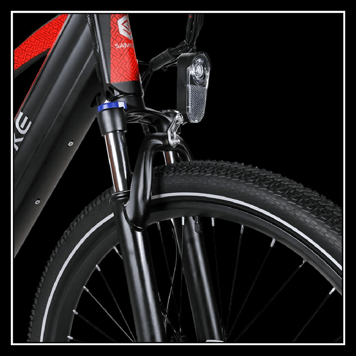 SAMEBIKE XD26-II electric bike front fork, showcasing dual suspension and headlight design for enhanced safety.
