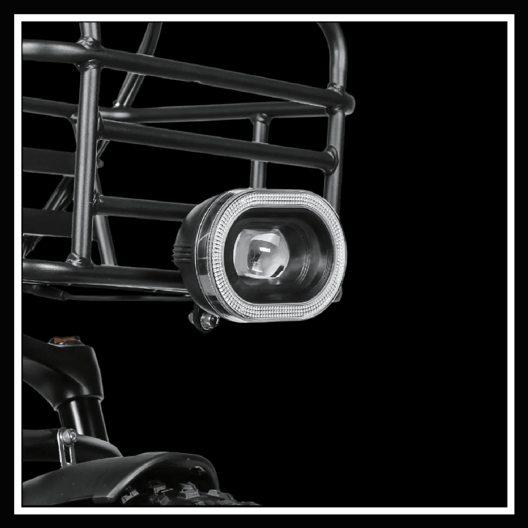 Close-up of the headlight on the SAMEBIKE XWLX09 II, highlighting its bright LED design and sturdy frame.