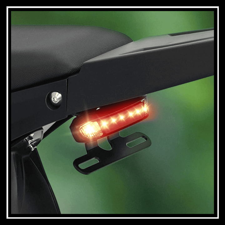 VIPCOO H3 3500W E-DIRT BIKE rear LED light for enhanced visibility on trails.