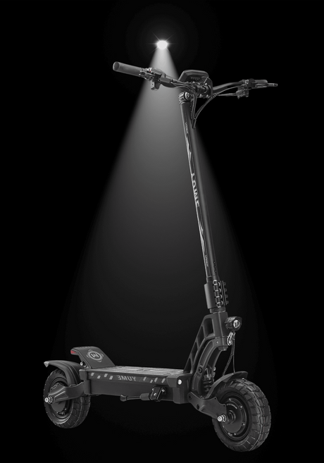 YUME HAWK electric scooter displayed under a spotlight, showcasing its sleek design and powerful build.