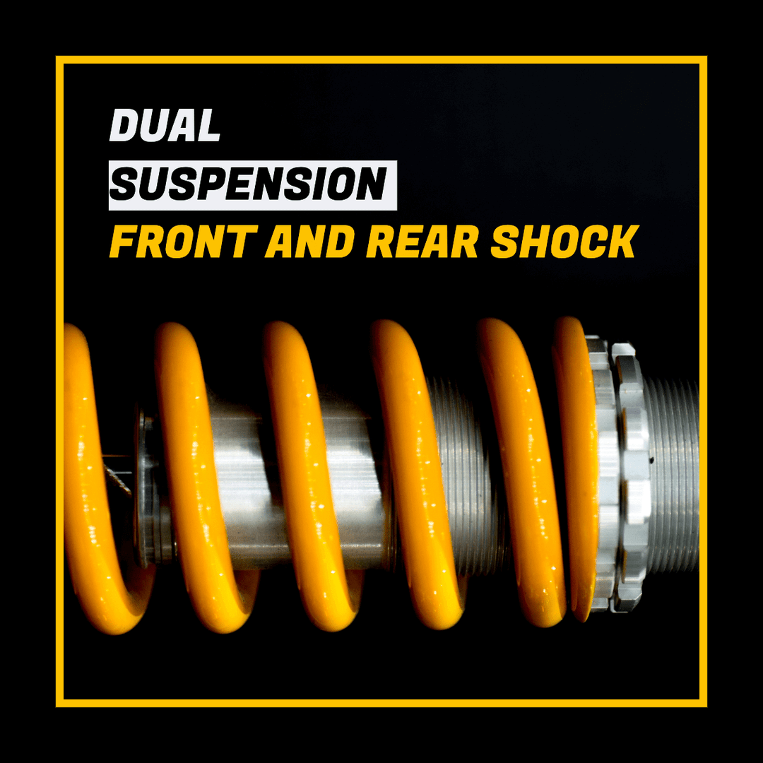 Close-up of dual suspension front and rear shock with yellow springs and metal components on a black background.