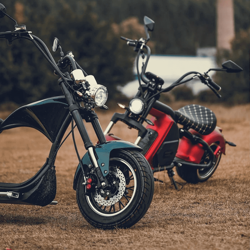 EAHORA M1P PLUS electric motorcycle in a scenic outdoor setting with a sleek chopper design.