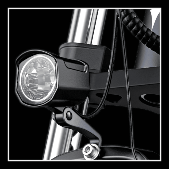 Close-up of the front light on an Engwe X26 electric bike, designed for safety and visibility in all terrains.