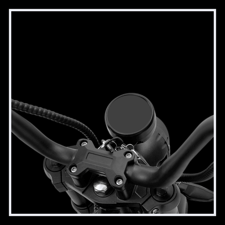 INTHEZONE M1PS electric motorcycle handlebars and control panel close-up.