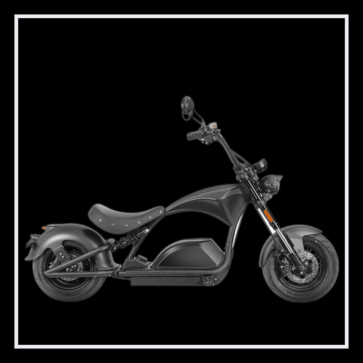 INTHEZONE M1PS electric motorcycle in sleek black design, showcasing Harley-style chopper features and modern aesthetics.