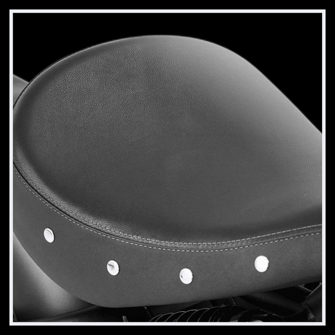 INTHEZONE M8S electric motorcycle seat design with sleek black leather and decorative studs.