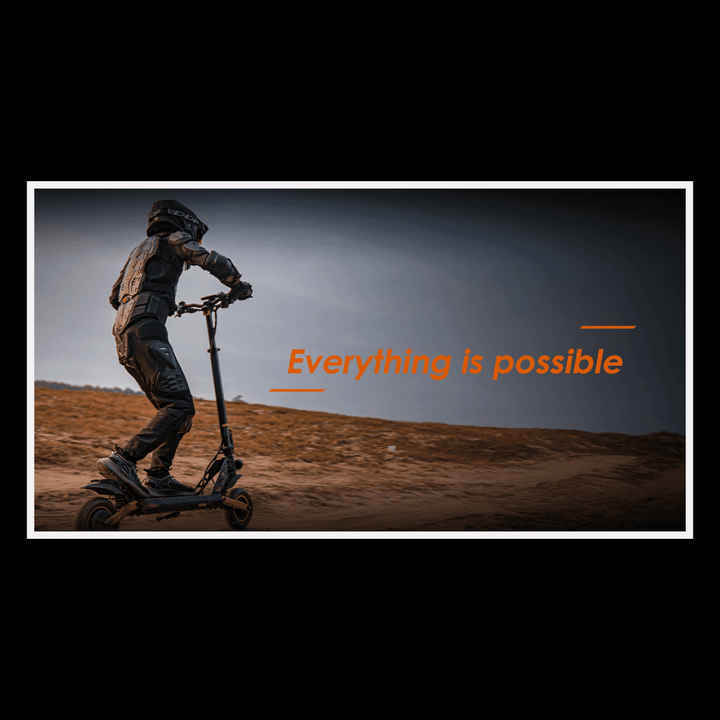 Person riding KUKIRIN G2 Pro electric scooter on a dirt path with the phrase 'Everything is possible' in view.