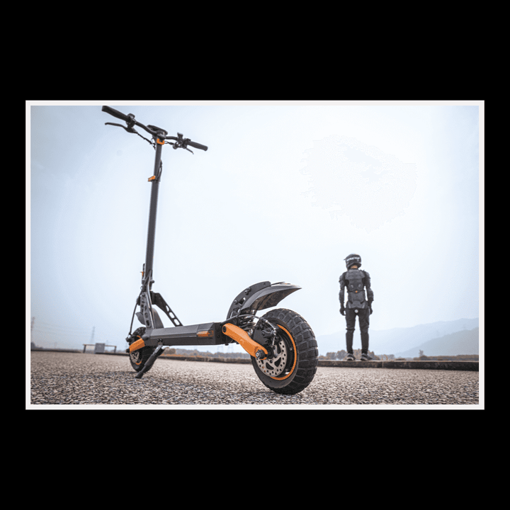 KUKIRIN G2 Pro electric scooter showcasing urban commuter design and durability on a scenic road.