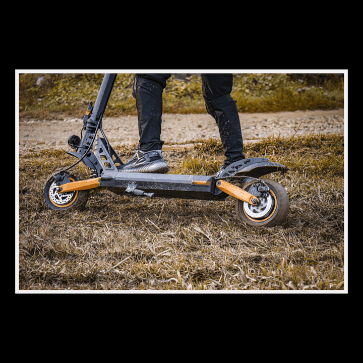KUKIRIN G2 Pro electric scooter on rough terrain showcasing its durable design and features.