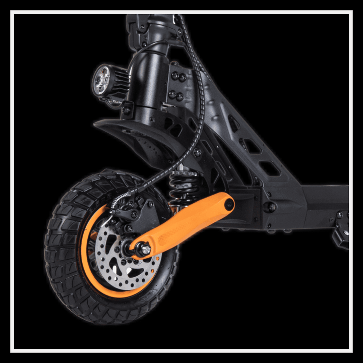Close-up view of the KUKIRIN G2 Pro electric scooter's wheel and suspension system.