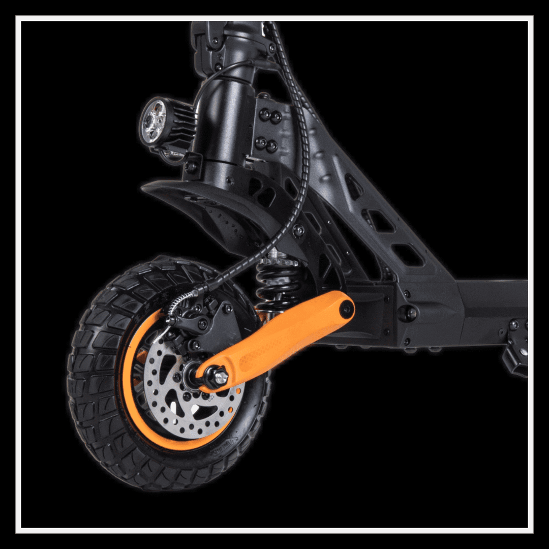 Close-up view of the KUKIRIN G2 Pro electric scooter's wheel and suspension system.