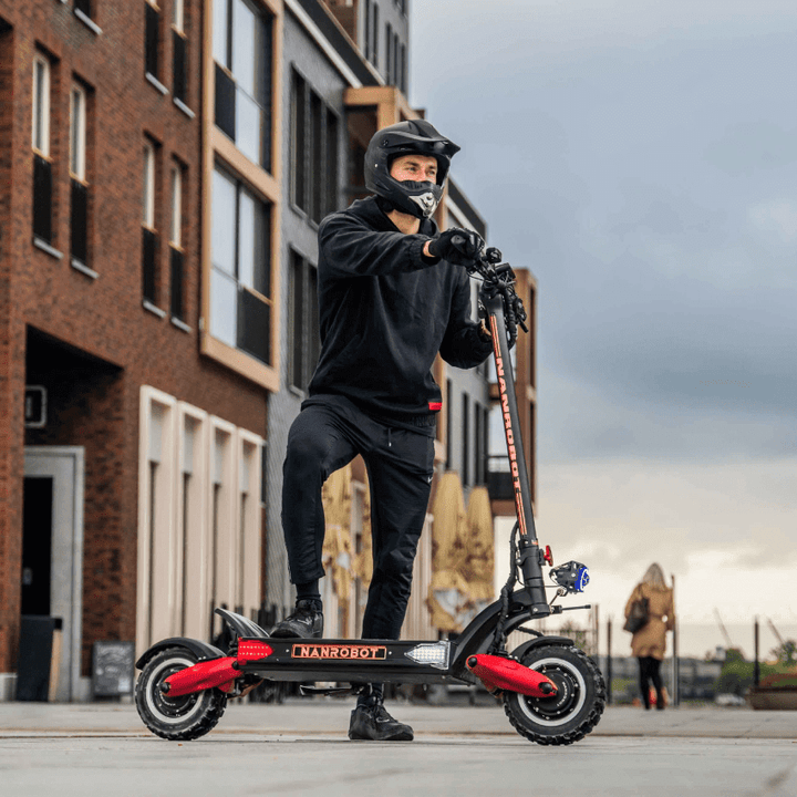Rider on a Nanrobot LS7+ electric scooter showcasing its sleek design and performance.